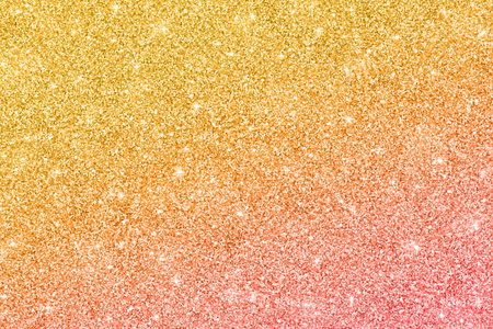 红色闪粉金色粉红色闪光纹理照片