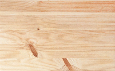 干净新鲜木材的木制背景。 胶合叠层木材。