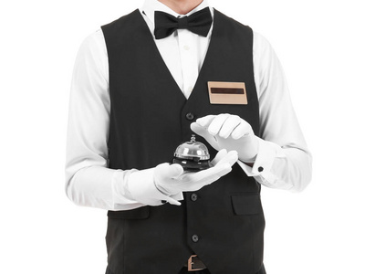 英俊的行李员在白色照片