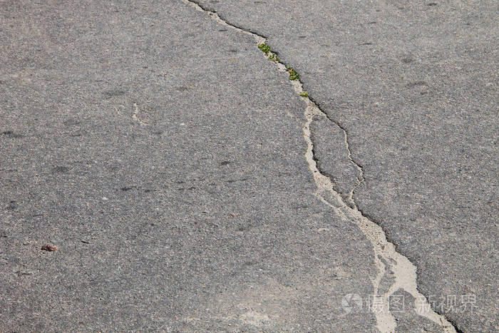 沥青背景下的裂缝纹理