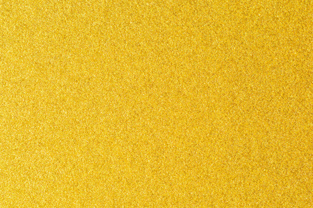 金色的彩漆墙.奢华的金色背景和墙纸.金箔纸或包装纸照片