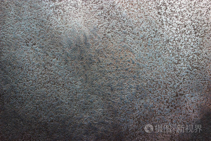 黑色钢板纹理深色背景的磨损金属