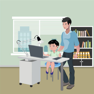 父亲与儿子做家庭作业在台式计算机