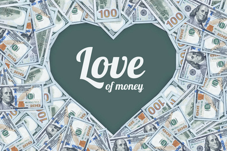 100美元钞票在心脏的形状, 金钱的爱照片