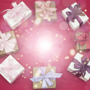 喜庆背景与礼品盒粉红色背景图片