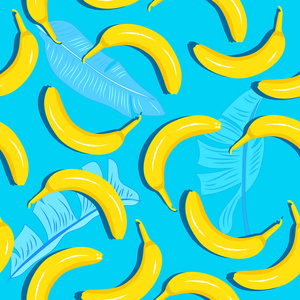 黄色香蕉在蓝色背景与香蕉叶子, 媒介海