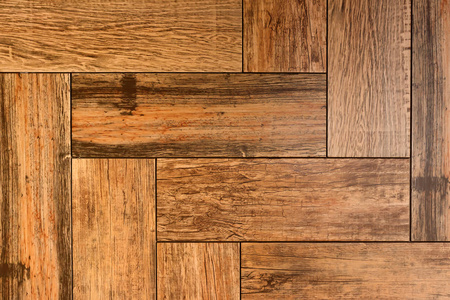 纹理是一个木制棕色地板. 棕色木板镶花.照片