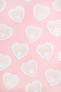 s Day composition. Heart symbols on pale pink background. Flat l