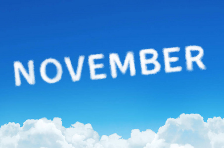 词11月由云彩蒸汽蒸在蓝天背景。月计划, 时间表概念