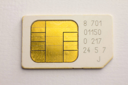 sim 卡手机芯片的白色背景照片
