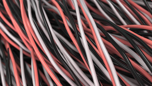 黑色, 白色和红色的绞线和电线在黑表面