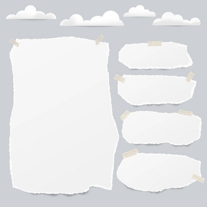 撕成碎片的白色空白便笺, 笔记本纸带灰色背景云