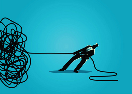 解开绳子商人试图解开纠结的绳索或电缆照片