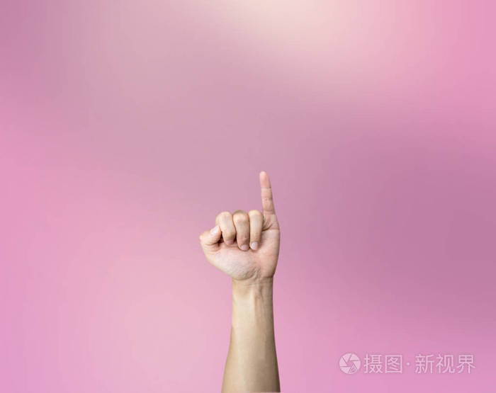 粉红色的发誓手势粉红色的背景