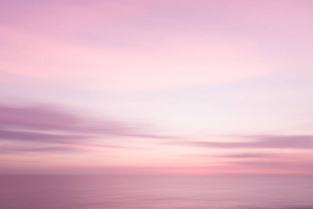 抽象粉红色日落天空和海洋自然背景