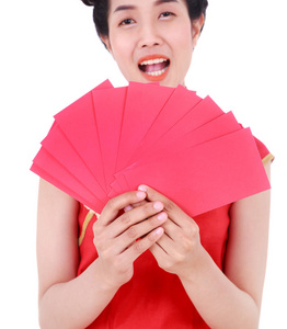 快乐的农历新年红色信封在妇女的手被隔绝了
