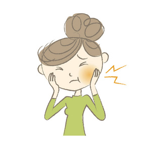 年轻女子牙痛照片