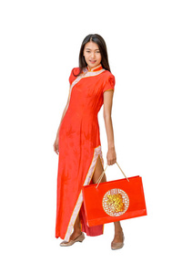 中国妇女拿着购物袋, 孤立的背景与 cli