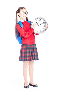 学校女孩举行时钟