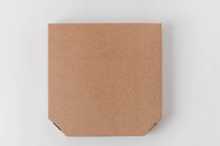 棕色纸披萨盒的俯视图