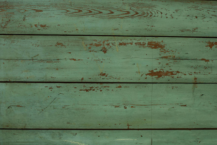 绿色划伤木板。木材质地