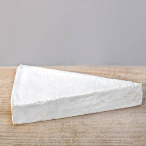 s milk cheese from  French region. Top view. Copy space