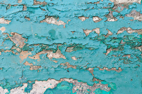 水泥蓝墙的灰色纹理，有裂缝和洞的背景和纹理。