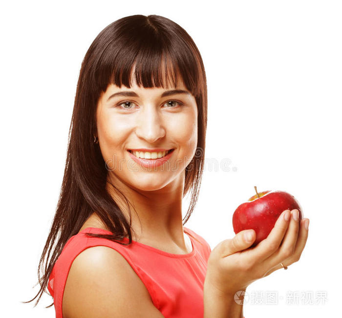 手里拿着红苹果的小女孩