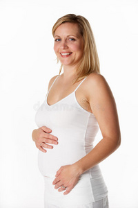 4个月孕妇穿白色衣服的摄影棚肖像