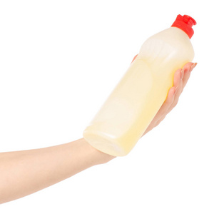 洗碗清洁剂瓶在手柠檬黄色