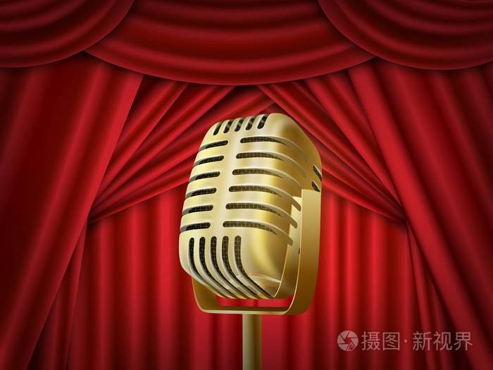 老式金属麦克风.红色丝绸窗帘背景.空剧场舞台上的复古麦克风