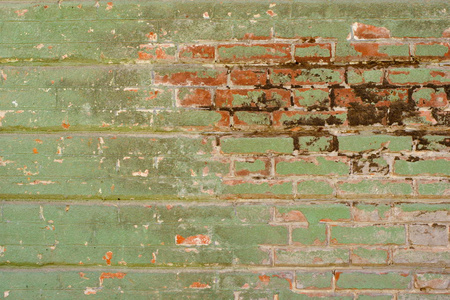 旧的绿色风化破旧砖墙, 破损的石膏背景纹理