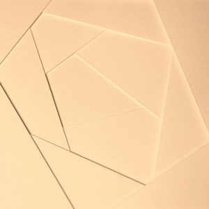 抽象几何背景的浅色色调从厚浅黄色, 米色纸, 纸板板照片
