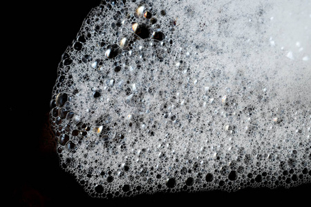 抽象背景白色肥皂泡沫纹理.洗发水泡沫与照片