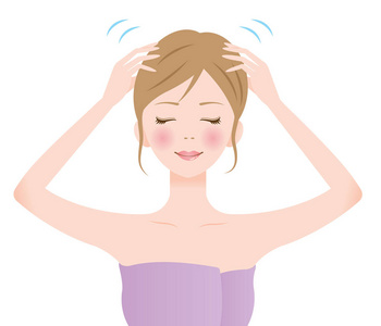 做头年轻女子给自己做头皮按摩.美容保健概念照片