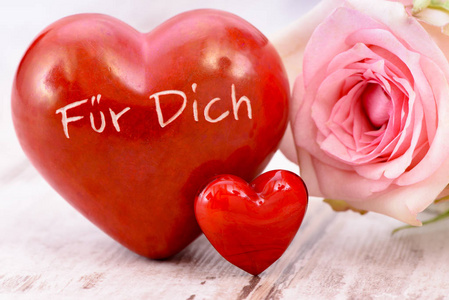 玫瑰花和心脏与 inscripton 在德语 为您