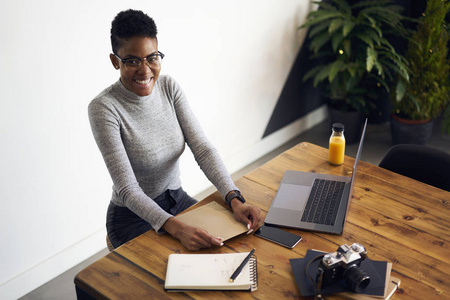 t wait for open envelope, smiling attractive female blogger sati