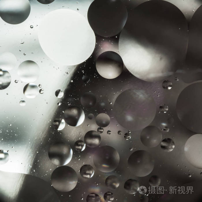 混合水和油, 颜色背景与软离焦, 宏观抽象