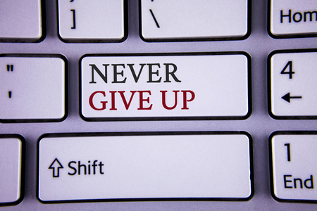 手写文字书写永不放弃.概念意义是坚持不懈的激励自己成功永不回头用