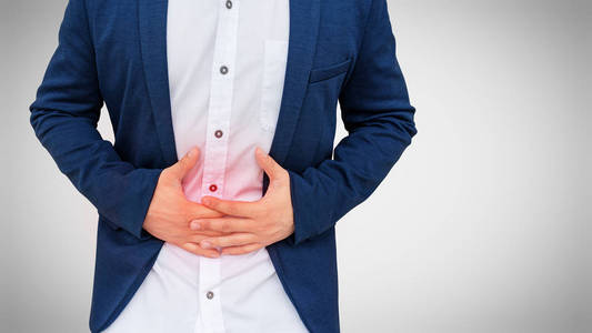 商人痛着他的胃照片