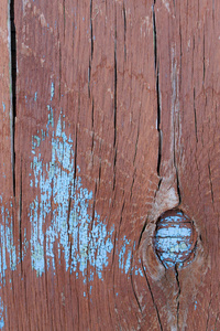 旧的木制背景与残留在木材上的旧油漆碎片。一棵老树的质地, 板上涂有油漆, 老式背景剥落油漆。旧蓝板, 漆破, 复古, 宇