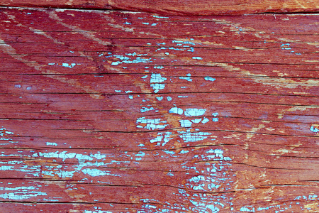 旧的木制背景与残留在木材上的旧油漆碎片.