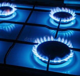厨房煤气炉燃烧的蓝色气体火焰
