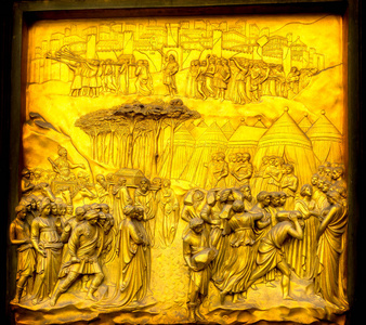 杰里科的天堂之门吉贝蒂铜门洗礼多摩大教堂佛罗伦萨意大利。 洗礼是在1100年代创建的。 青铜门创造了14世纪初的洛伦佐吉贝蒂。