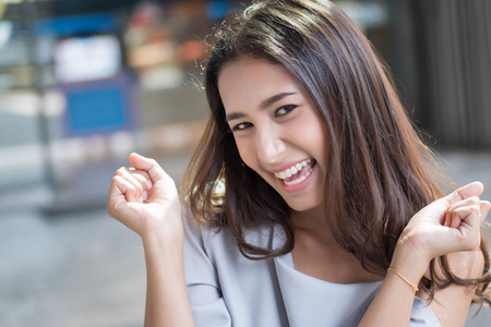  portrait of surprised, excited asian woman with exciting, oh, u