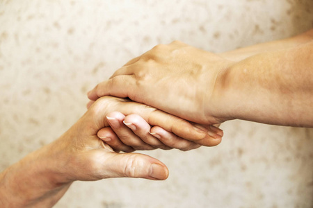  care giver, hands close up. Grand mother everyday life. Backgro