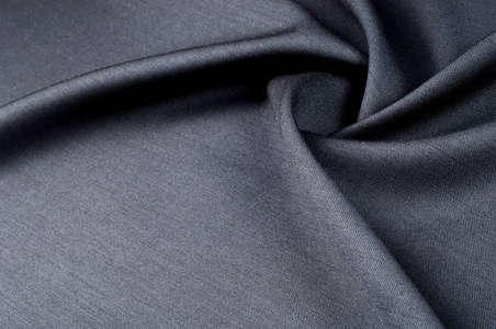 背景纹理图案。 布毛西装灰色。 一个真正的法兰绒总是由梳理纱卡绒法兰绒是理想的在寒冷的几个月，它是沉重的舒适和柔软。