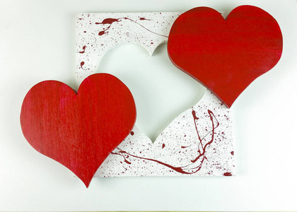 s wooden red heart on white background  top view