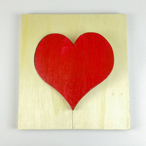 s wooden red heart on white background  top view