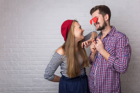 s Day. A man with a beard and a woman with blond long hair. Pape